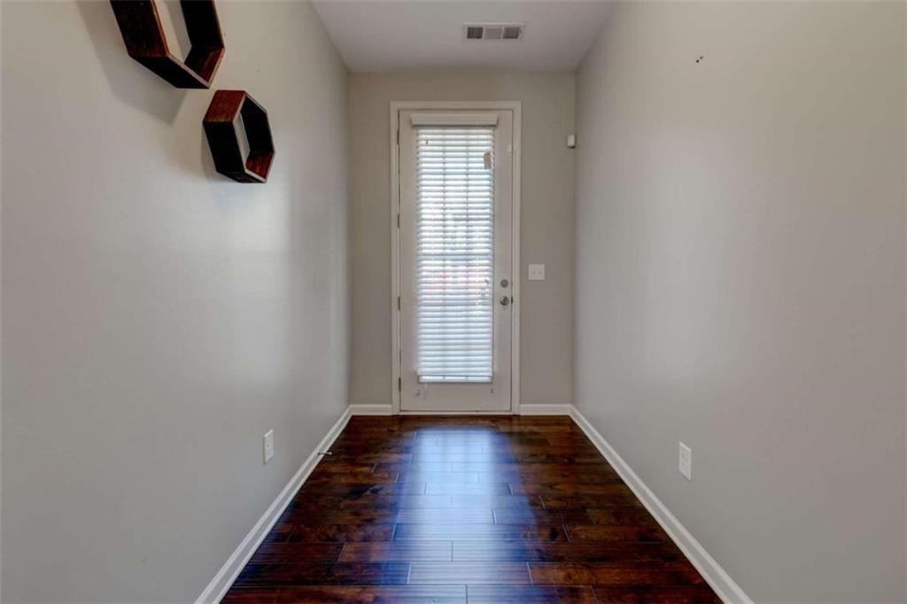 7601 Summer Berry Lane Lithonia, GA 30038 - Photo 3 of 34 a view of an entryway with wooden floor