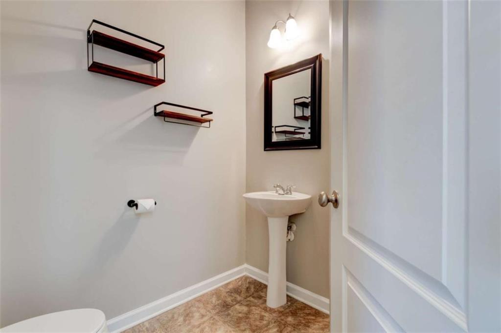 7601 Summer Berry Lane Lithonia, GA 30038 - Photo 6 of 34 a bathroom with a shower