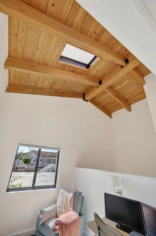 a bathroom with a sink double vanity granite and a mirror