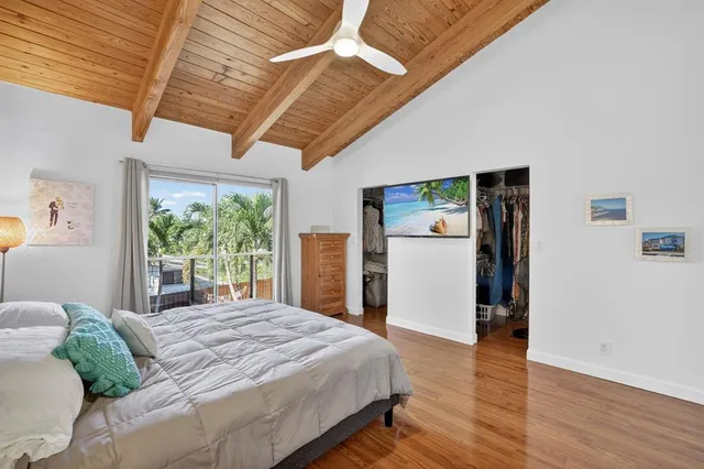 a view of a livingroom with furniture and windows