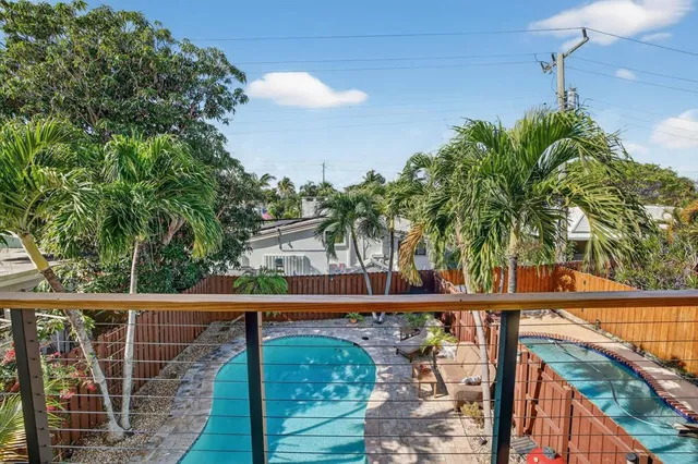 a view of a backyard with a patio