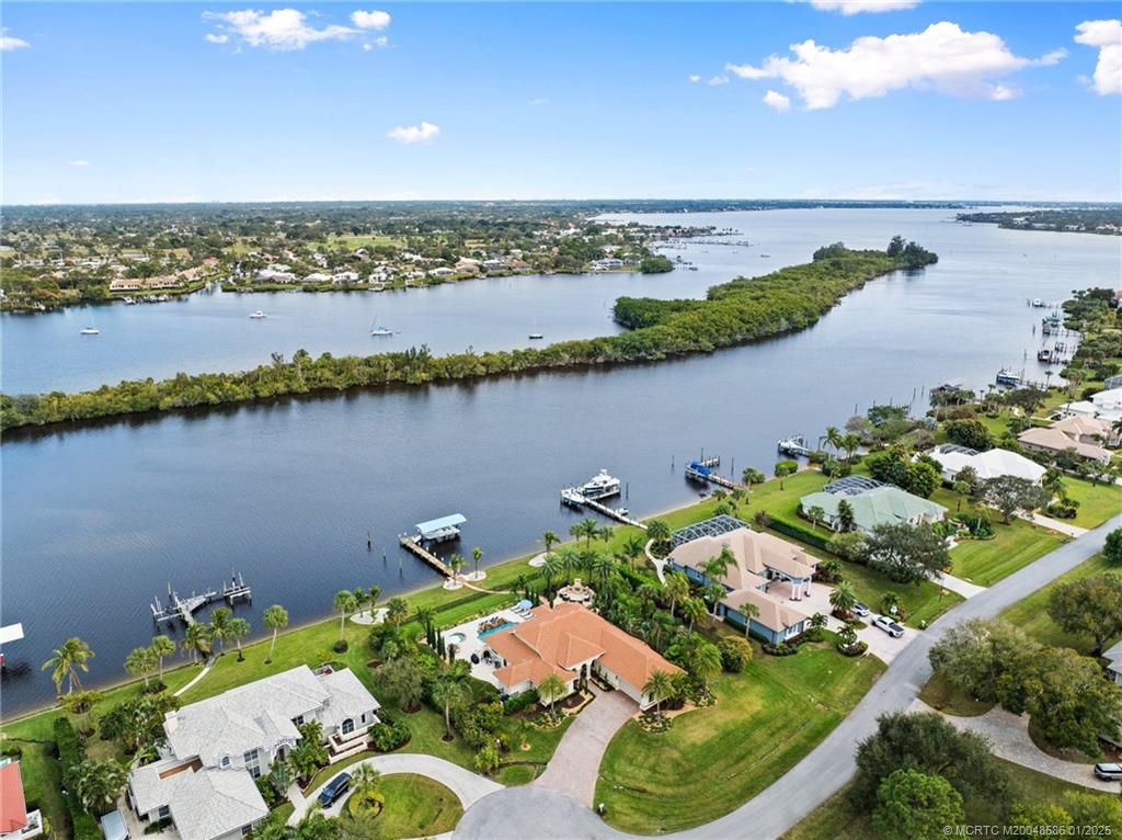 12038 Riverbend Road Port St. Lucie, FL 34984 - Photo 13 of 86 an aerial view of a houses with a lake view