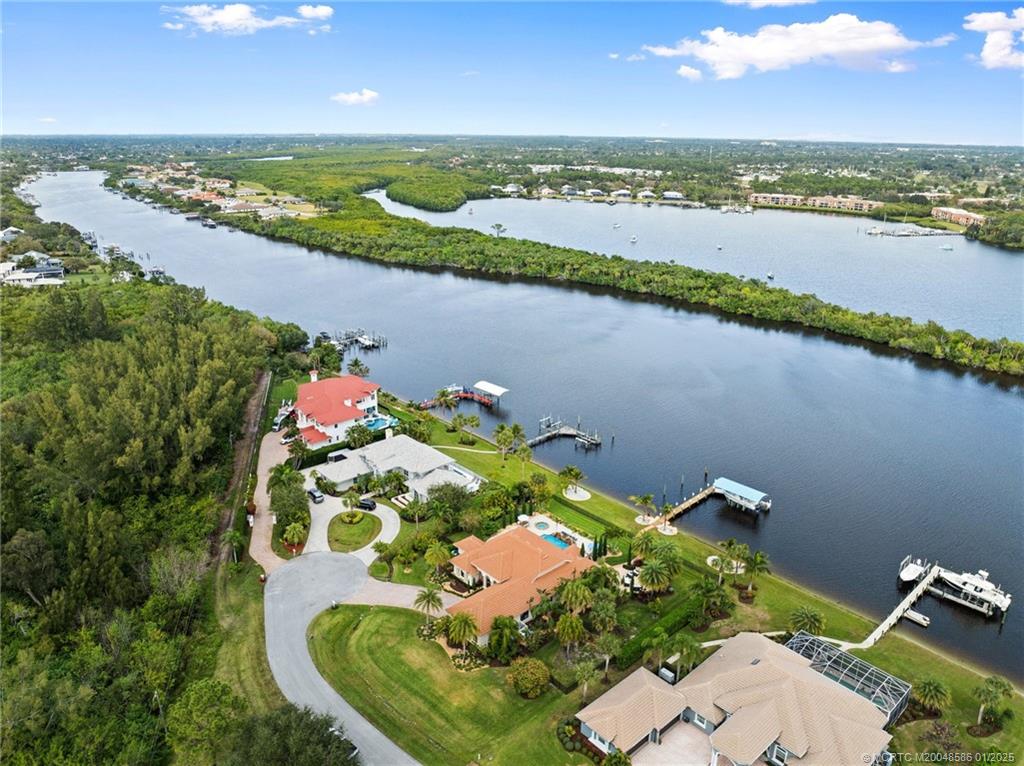 12038 Riverbend Road Port St. Lucie, FL 34984 - Photo 18 of 86 an aerial view of ocean residential house with outdoor space and seating