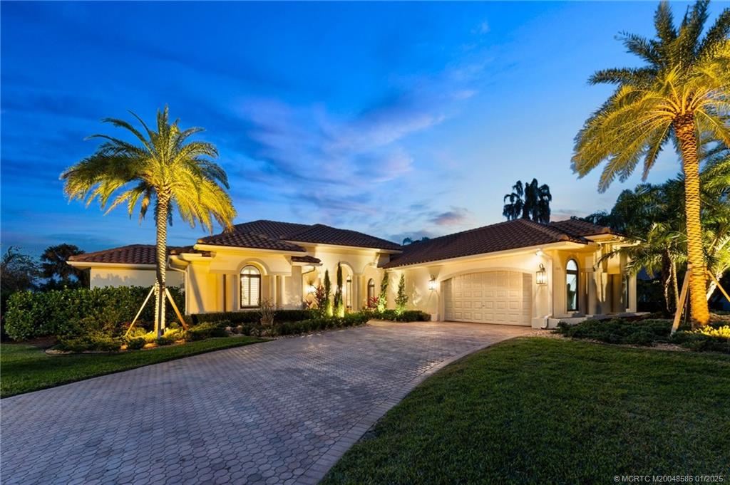 12038 Riverbend Road Port St. Lucie, FL 34984 - Photo 29 of 86 a view of a house with a yard