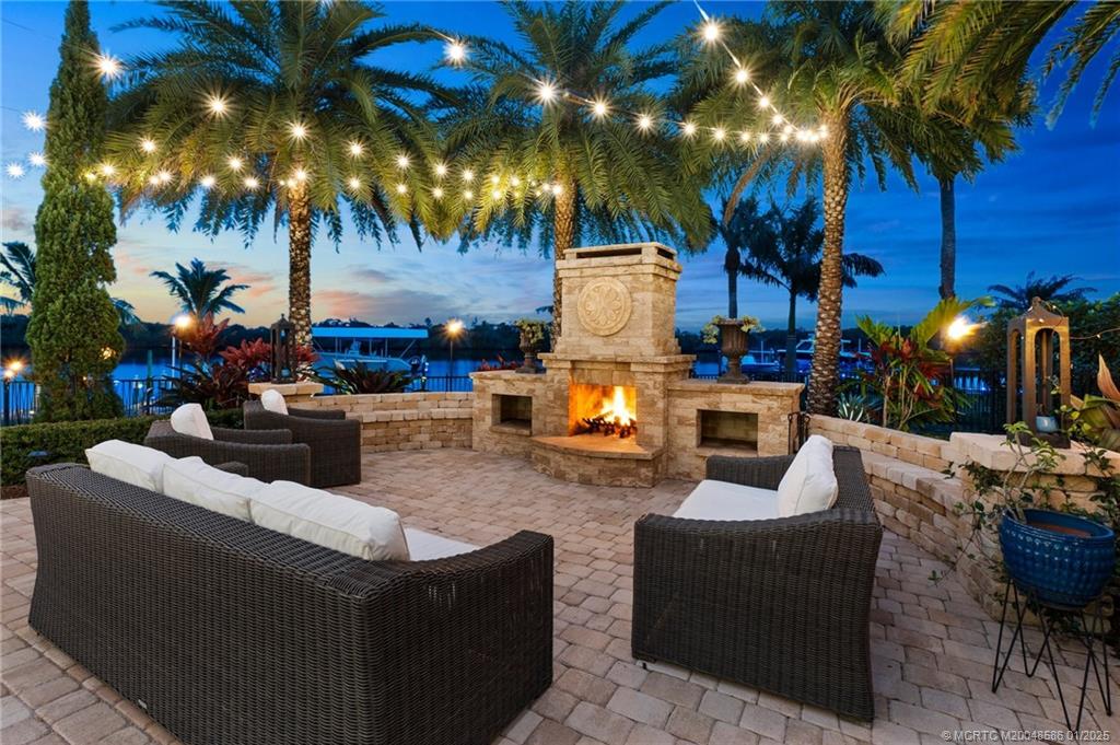 12038 Riverbend Road Port St. Lucie, FL 34984 - Photo 30 of 86 a outdoor living space with patio furniture