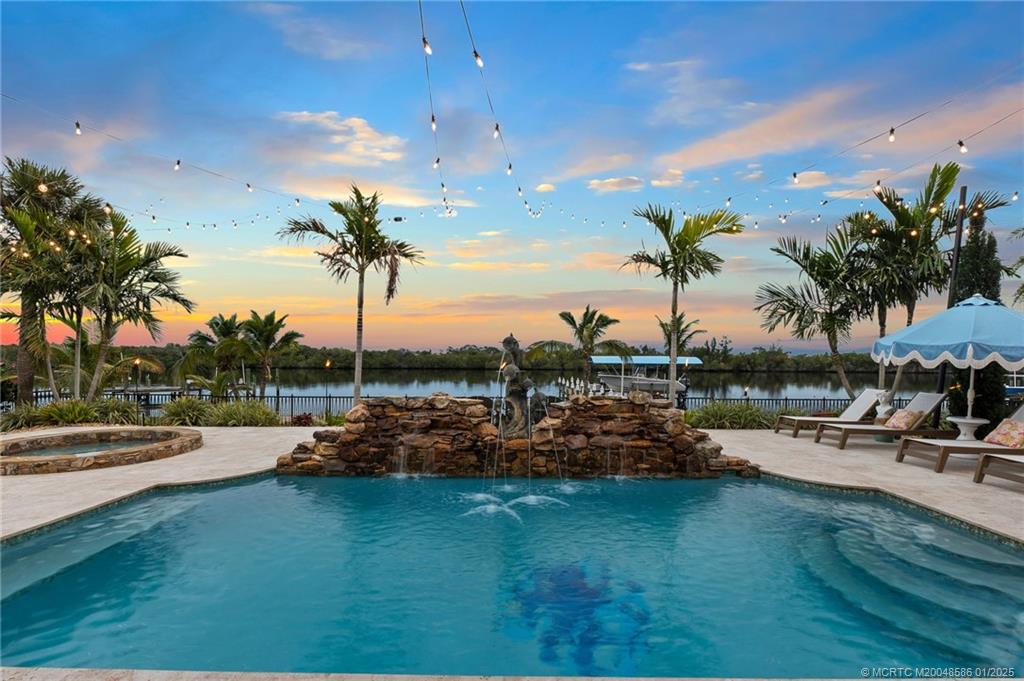 12038 Riverbend Road Port St. Lucie, FL 34984 - Photo 4 of 86 a view of a lake and outdoor space