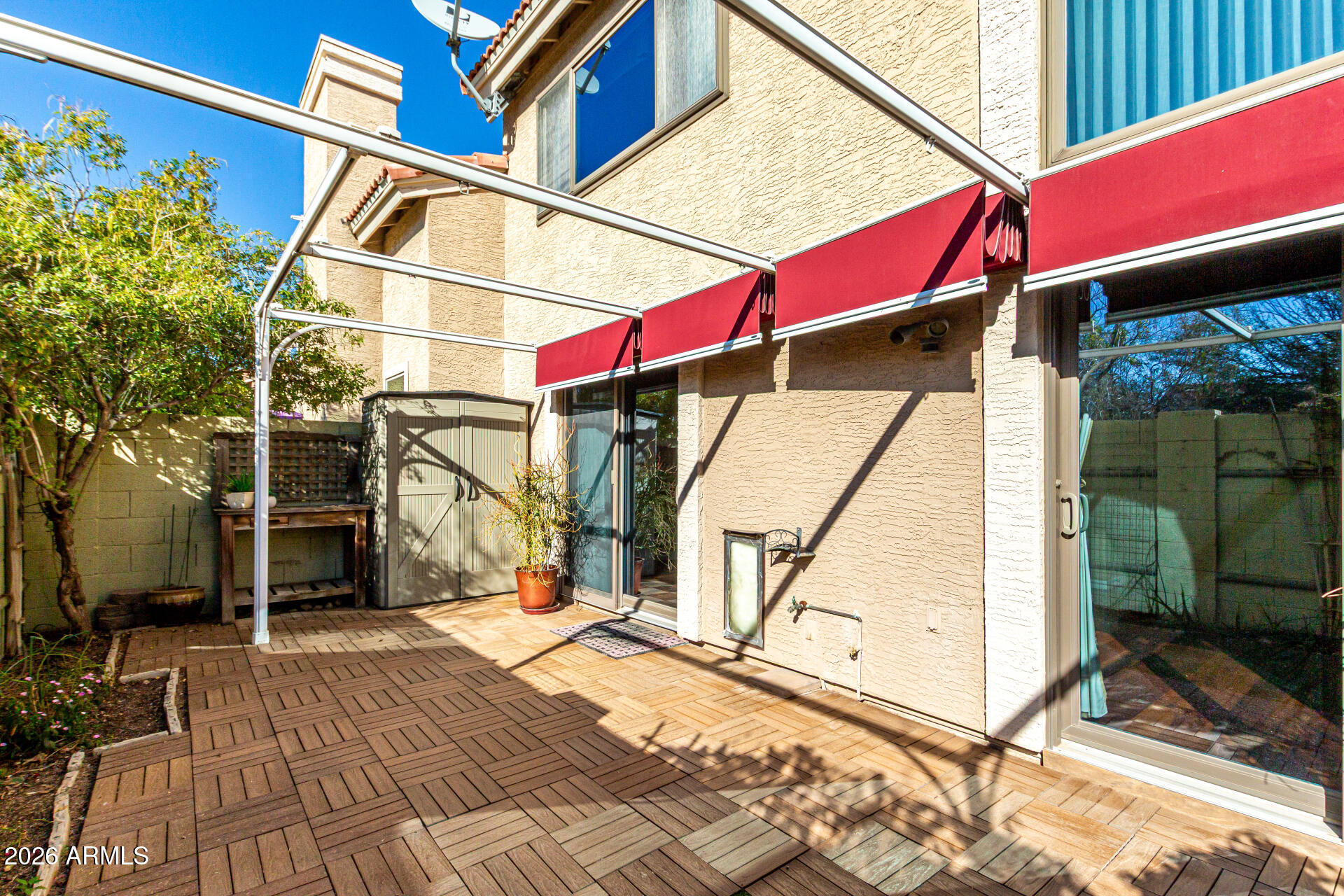 4279 East Agave Road Phoenix, AZ 85044 - Photo 26 of 31 a view of a house with a street