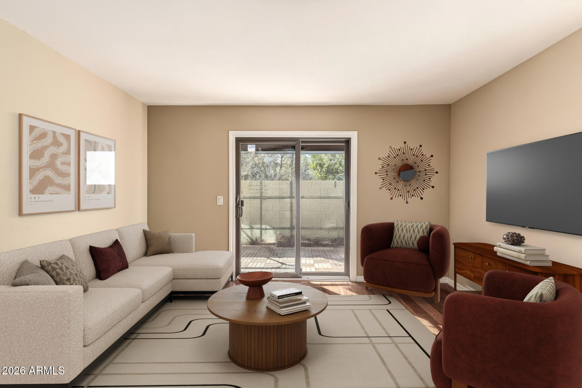 4279 East Agave Road Phoenix, AZ 85044 - Photo 3 of 31 a living room with furniture and a flat screen tv