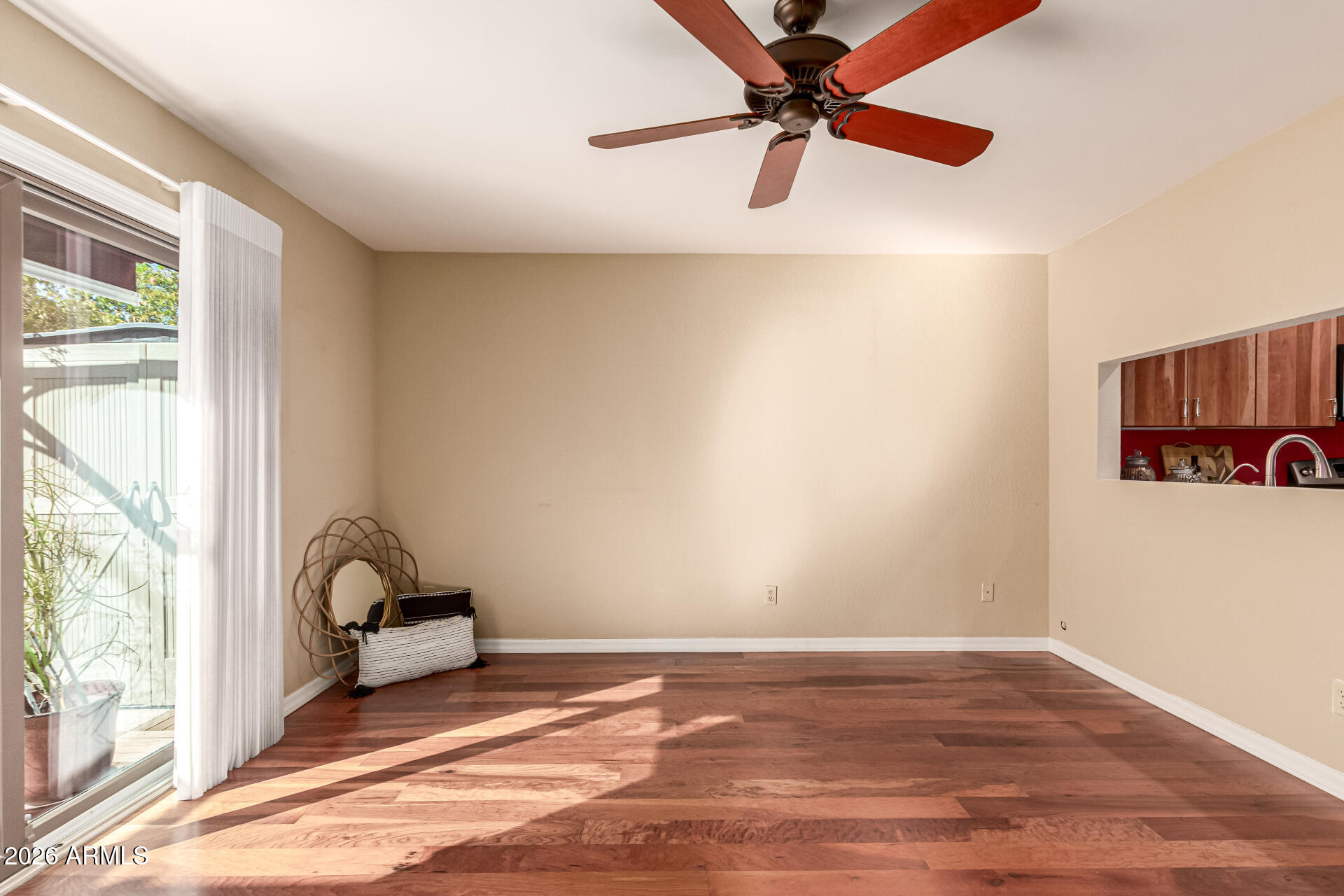 4279 East Agave Road Phoenix, AZ 85044 - Photo 5 of 31 a view of a room with a sink and a window