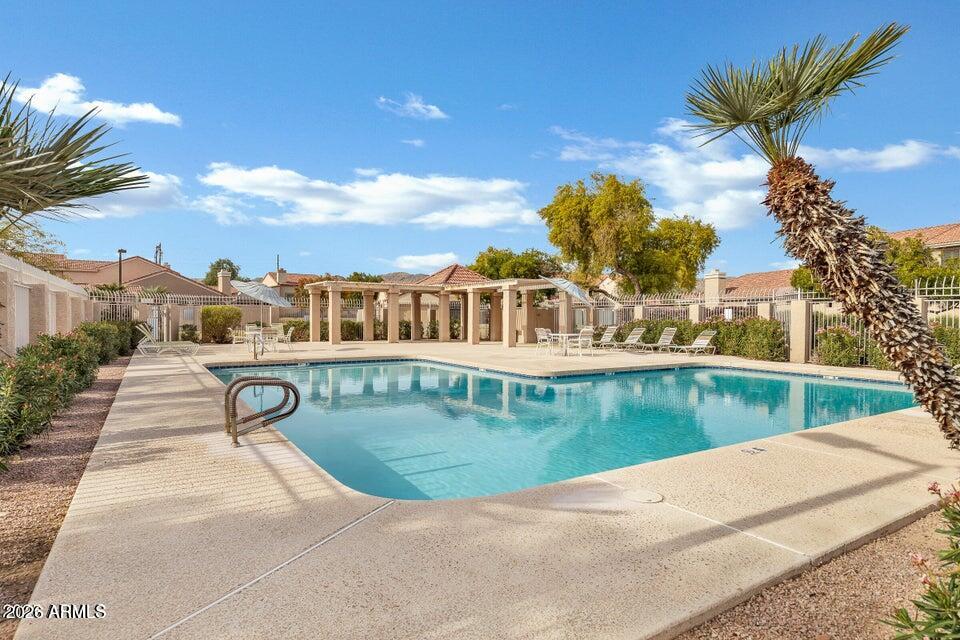 4279 East Agave Road Phoenix, AZ 85044 - Photo 7 of 31 a view of a house with a yard