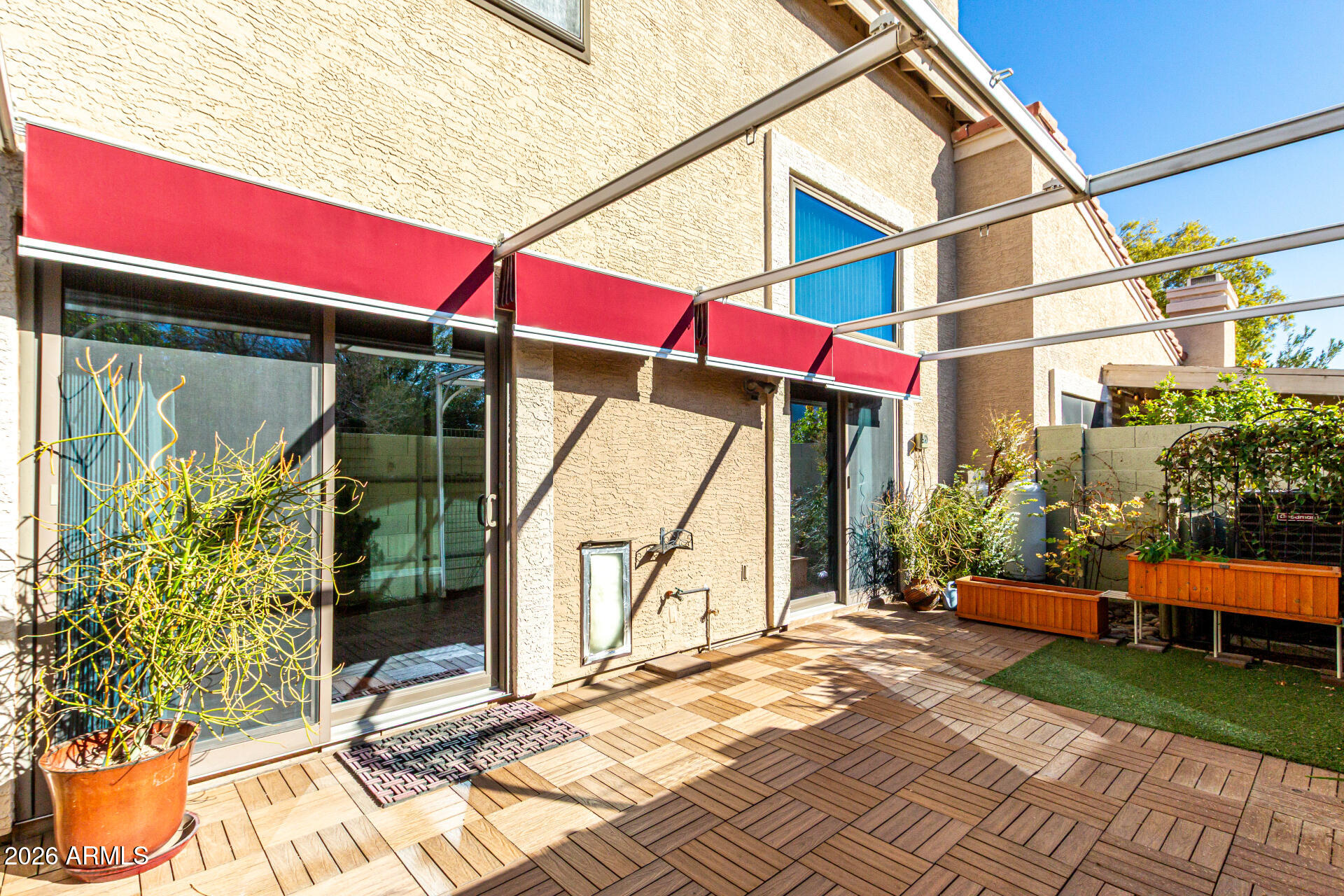 4279 East Agave Road Phoenix, AZ 85044 - Photo 8 of 31 a view of a house with a yard