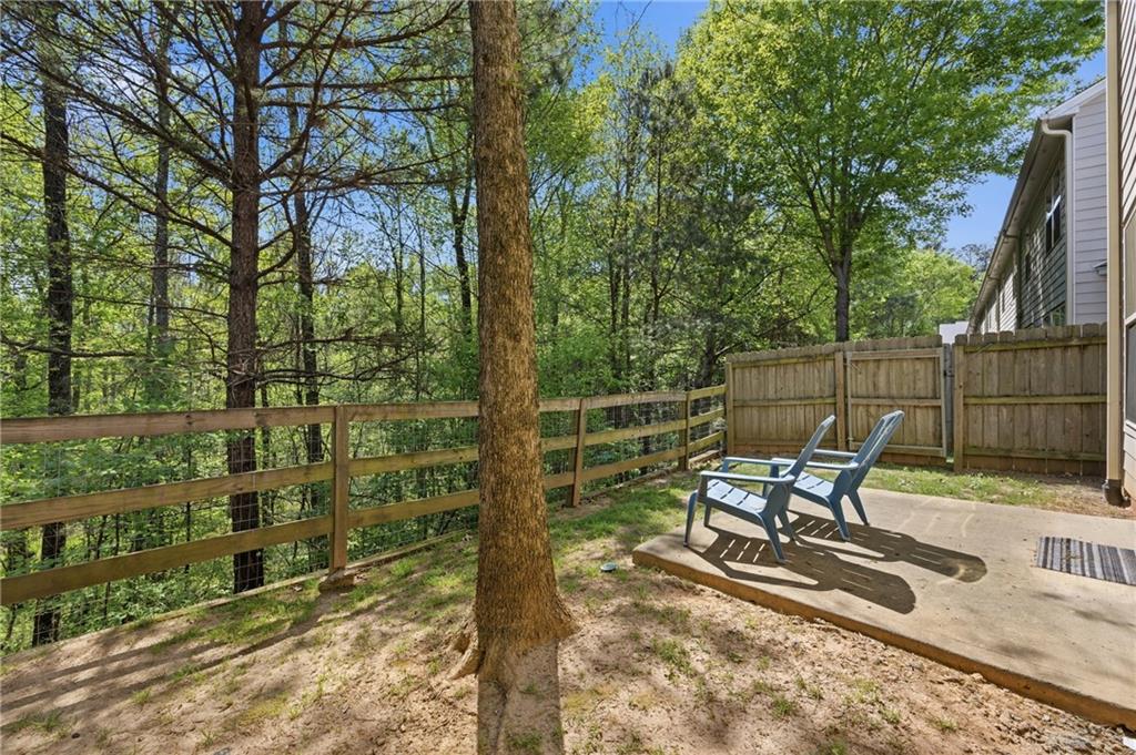 4021 Princeton Lakes Pass Southwest Atlanta, GA 30331 - Photo 21 of 23 a view of chair and tables in the patio