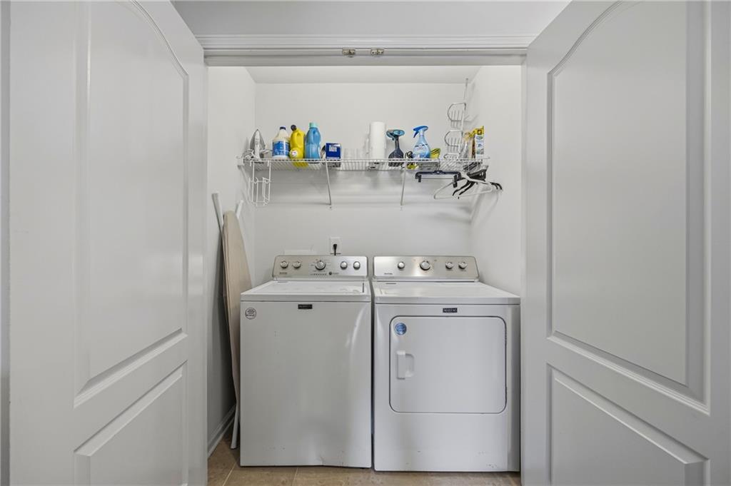 4021 Princeton Lakes Pass Southwest Atlanta, GA 30331 - Photo 10 of 23 a utility room with dryer and washer