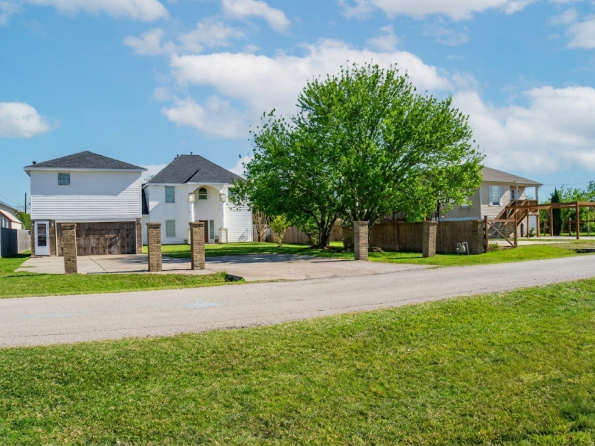 230 22nd Street Dickinson, TX 77539 - Photo 12 of 15 The luxury home across the street.