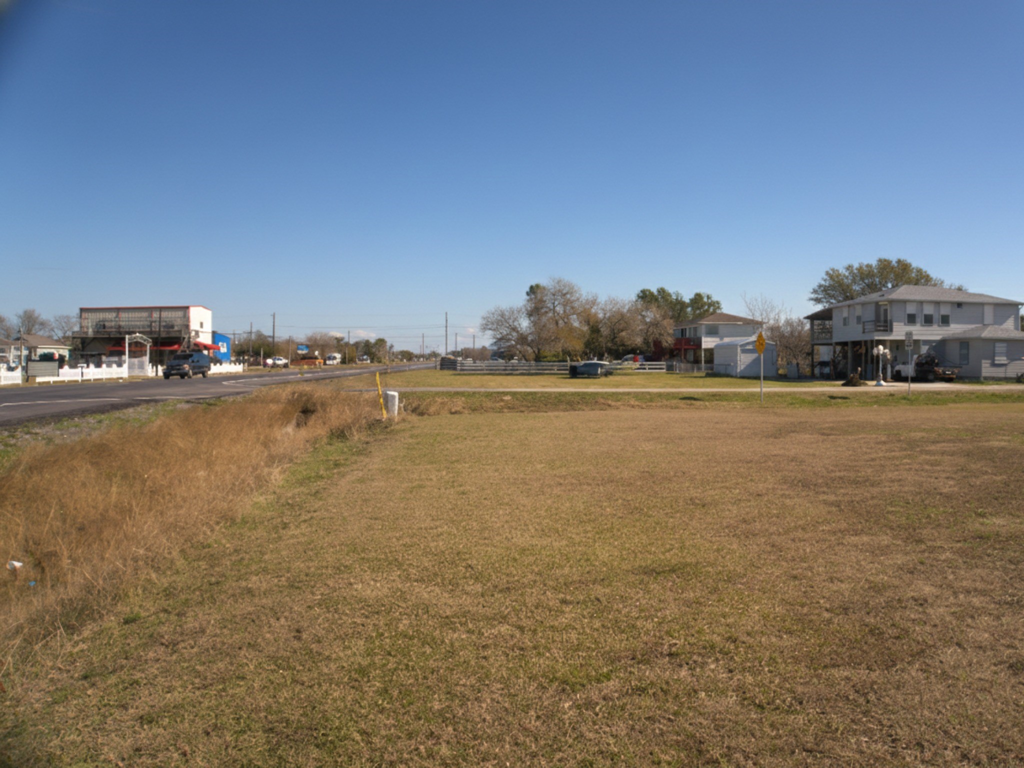 230 22nd Street Dickinson, TX 77539 - Photo 13 of 15 Street-level perspective of the hard corner and access points.