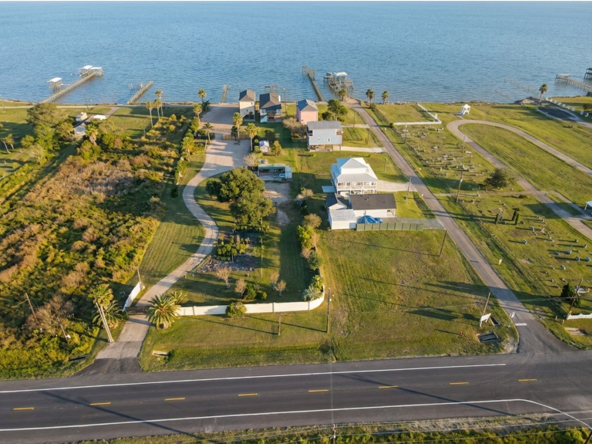 230 22nd Street Dickinson, TX 77539 - Photo 2 of 15 Shows the docks, the luxury piers, and the property’s relation to the shoreline.
