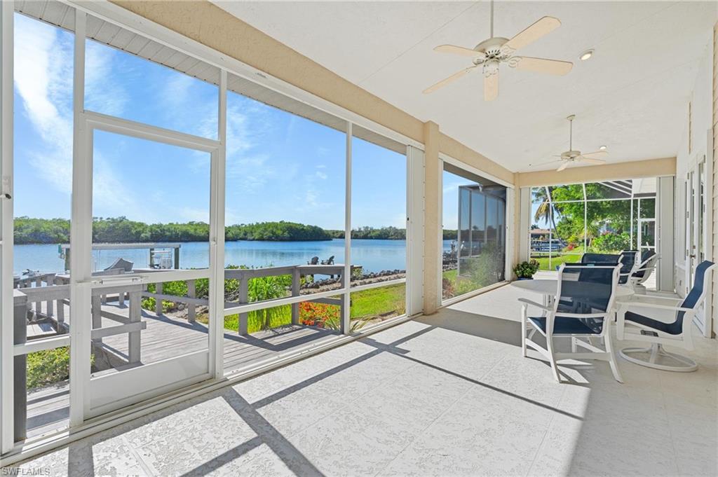 132 Wilderness Cay Naples, FL 34114 - Photo 19 of 24 a view of a dining room with furniture window and outside view