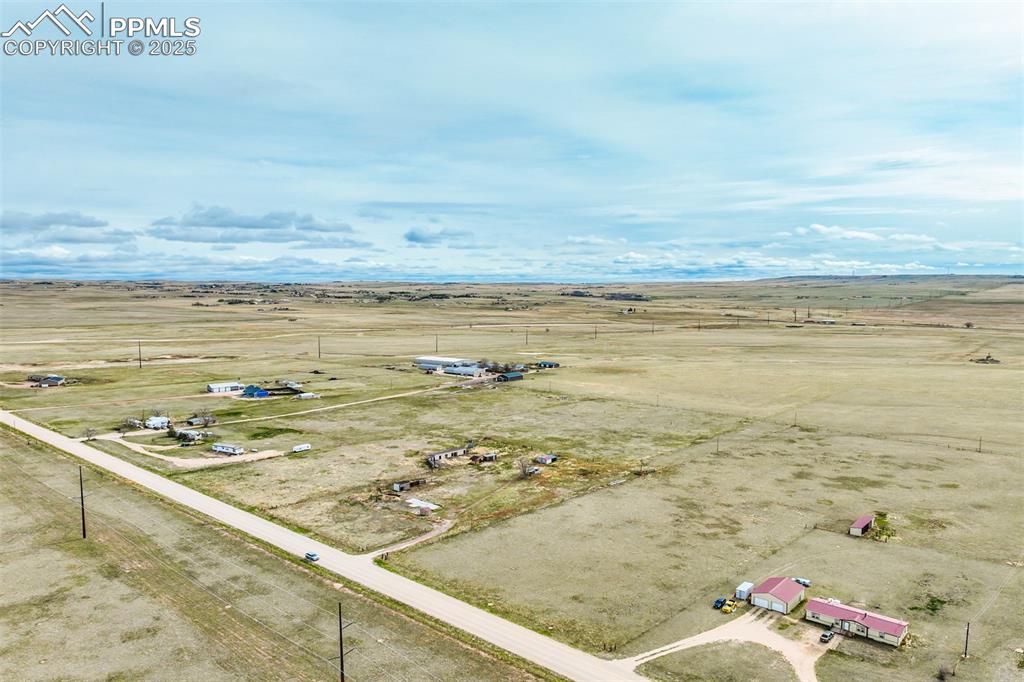 10165 McClelland Road Calhan, CO 80808 - Photo 22 of 25 Drone / aerial view featuring a rural view