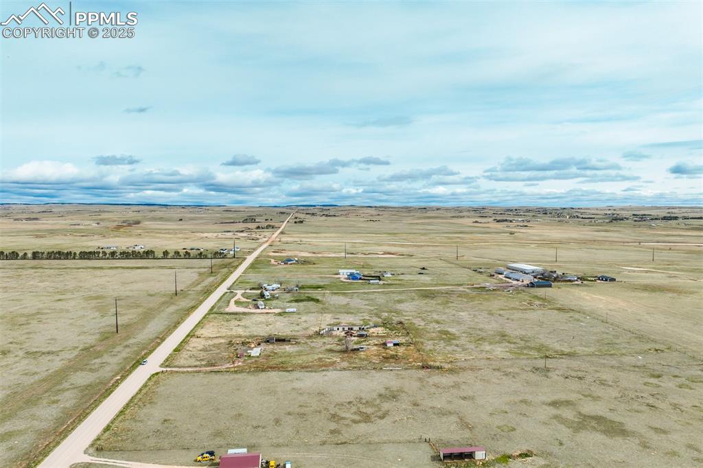 10165 McClelland Road Calhan, CO 80808 - Photo 23 of 25 Birds eye view of property featuring a rural view