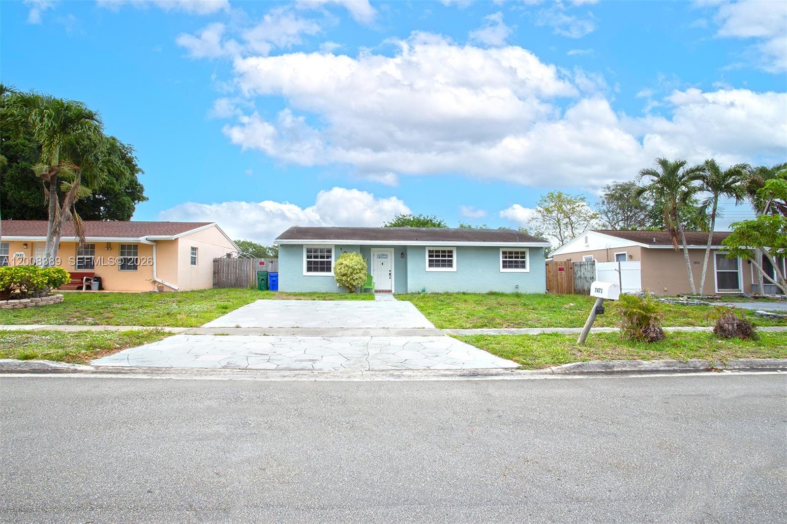 7471 Southwest 1st Street Margate, FL 33068 - Photo 1 of 39 a view of house with outdoor space and street view