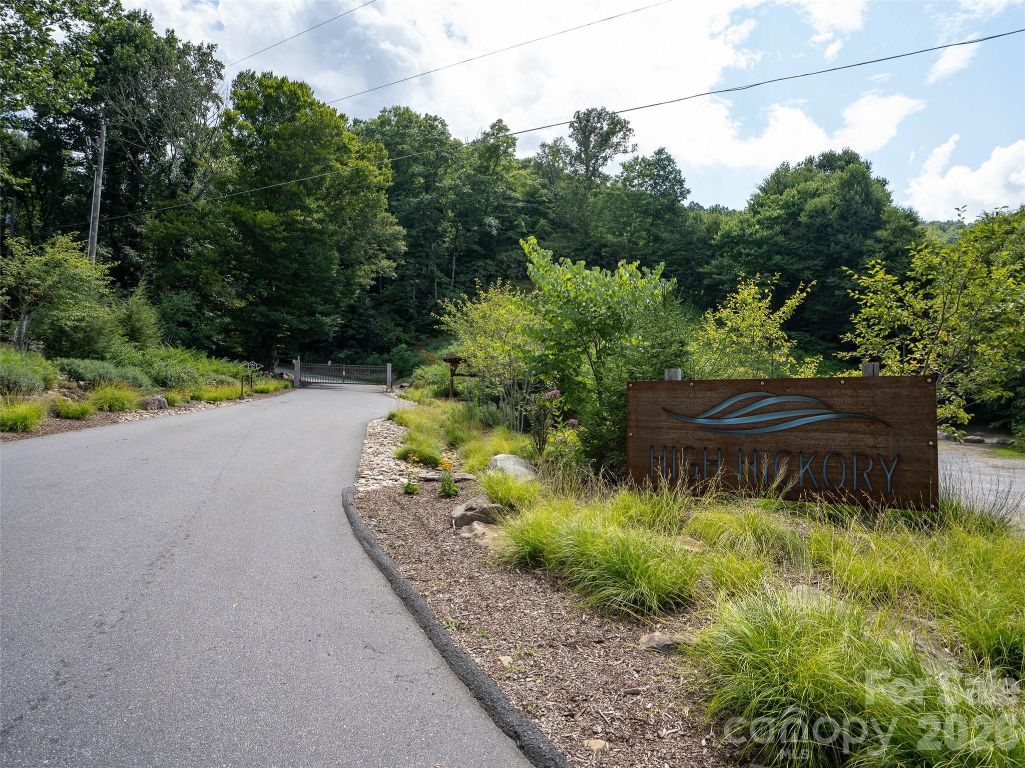 1394 Daydream Ridge Swannanoa, NC 28778 - Photo 5 of 31 a backyard of a house with lots of green space