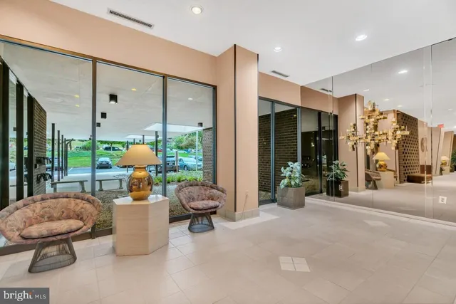 a large room with table and chairs