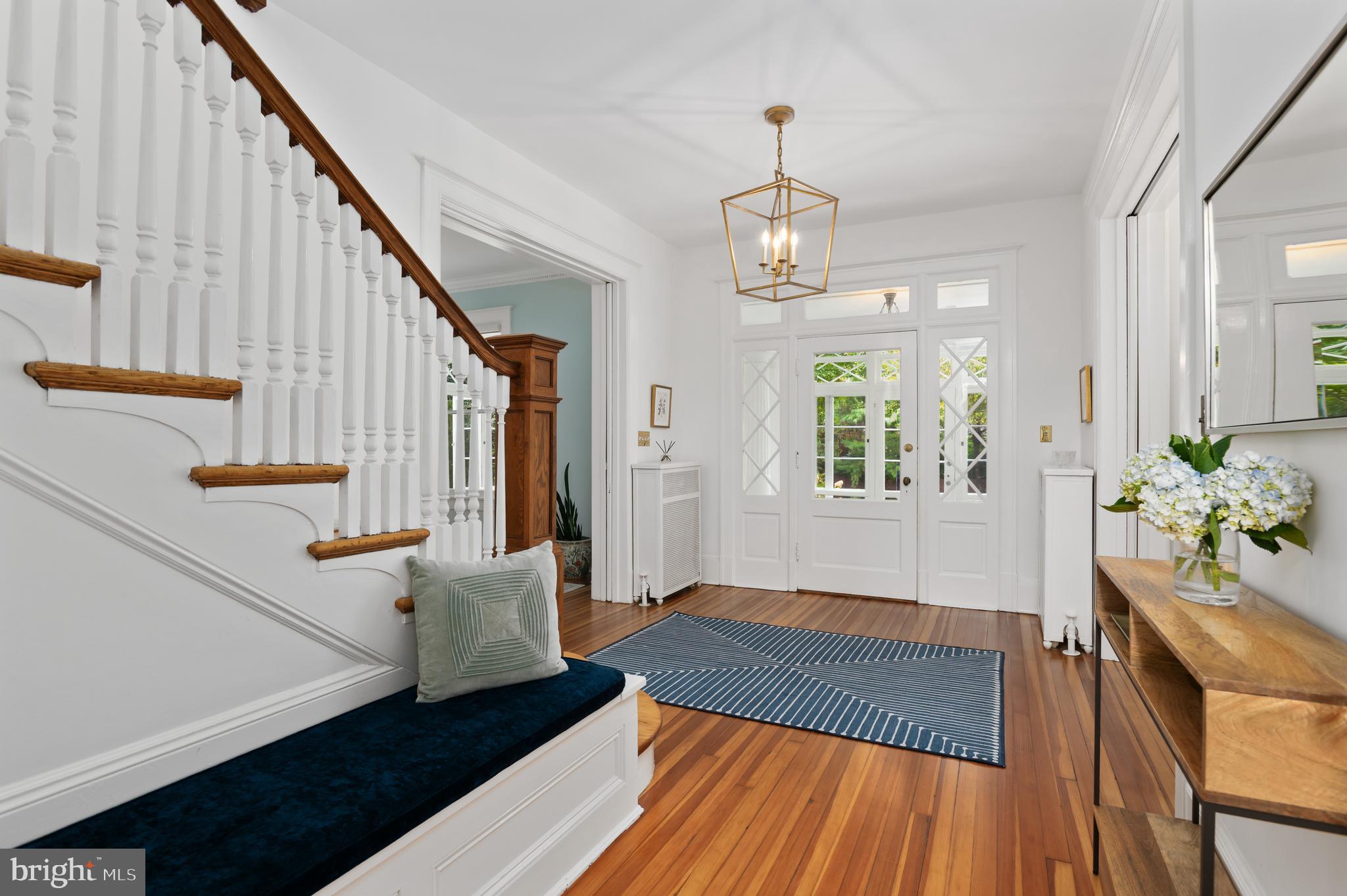 6515 Brookville Road Chevy Chase, MD 20815 - Photo 12 of 33 a living room with wooden floor and furniture