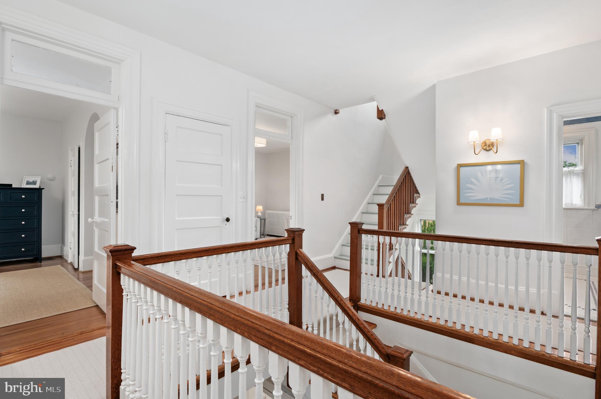 6515 Brookville Road Chevy Chase, MD 20815 - Photo 21 of 33 a view of staircase with railing and white walls