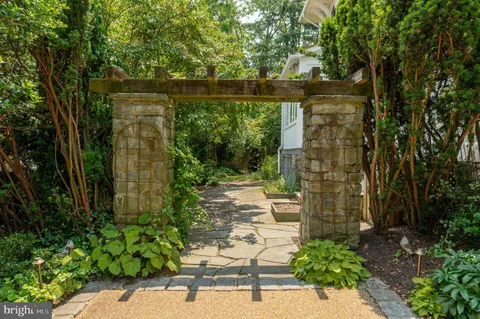 a backyard of a house with lots of green space