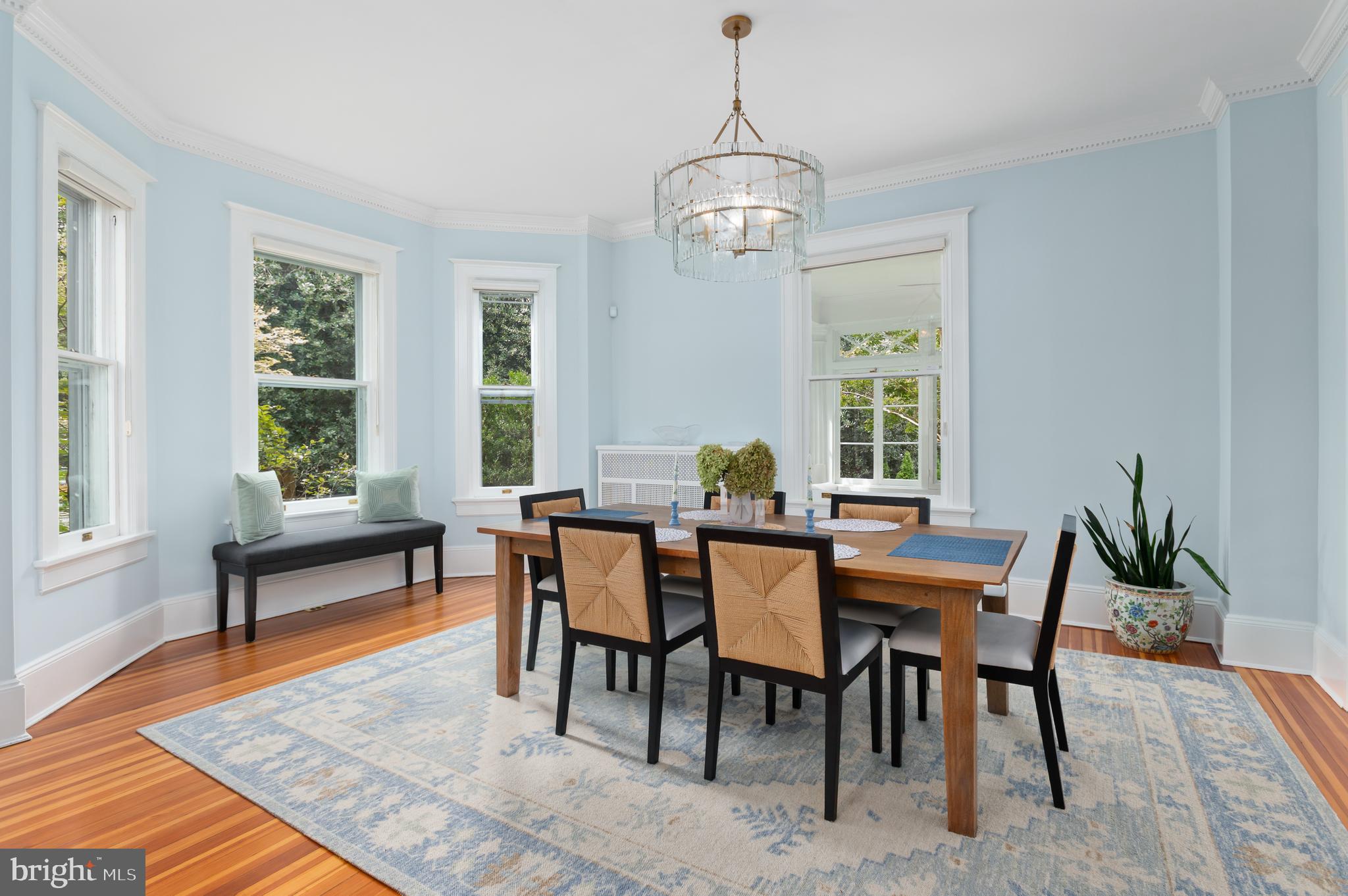 6515 Brookville Road Chevy Chase, MD 20815 - Photo 3 of 33 a view of a dining room with furniture window and wooden floor