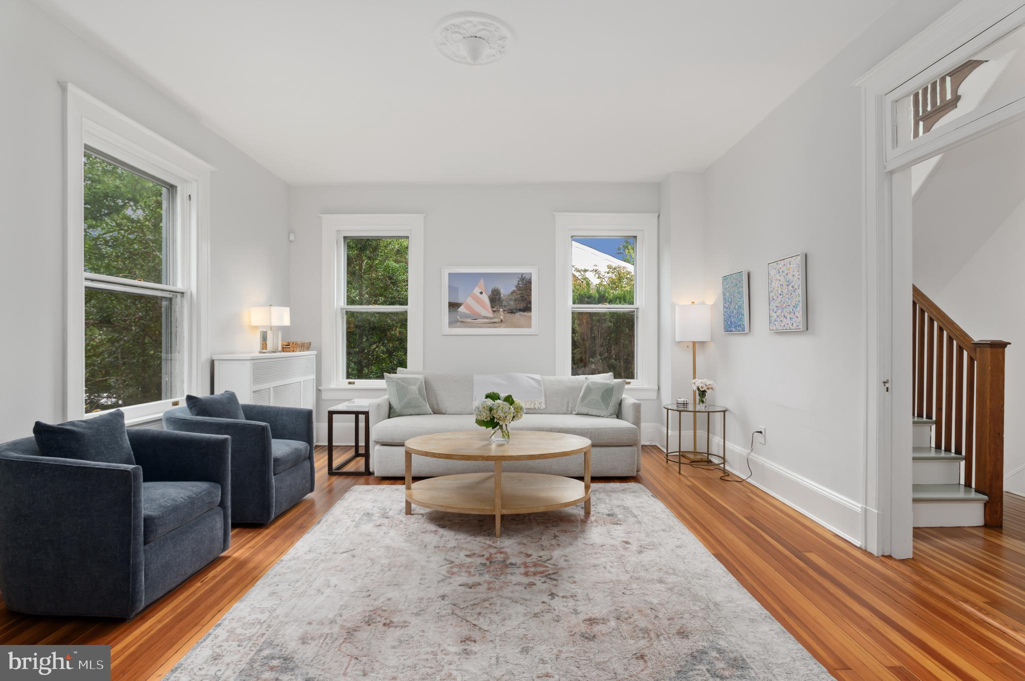 6515 Brookville Road Chevy Chase, MD 20815 - Photo 6 of 33 a living room with furniture and a large window