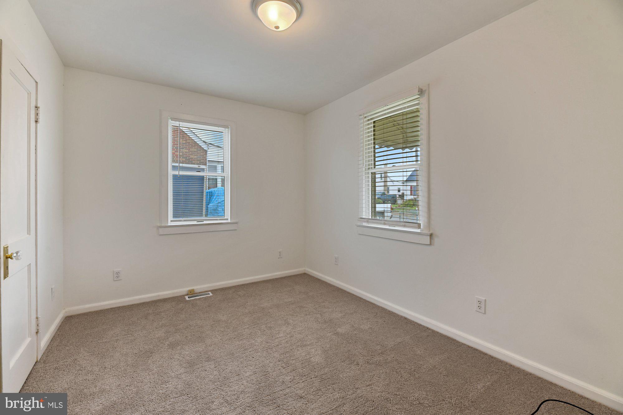 4 Plateau Road Baltimore, MD 21221 - Photo 11 of 19 an empty room with windows