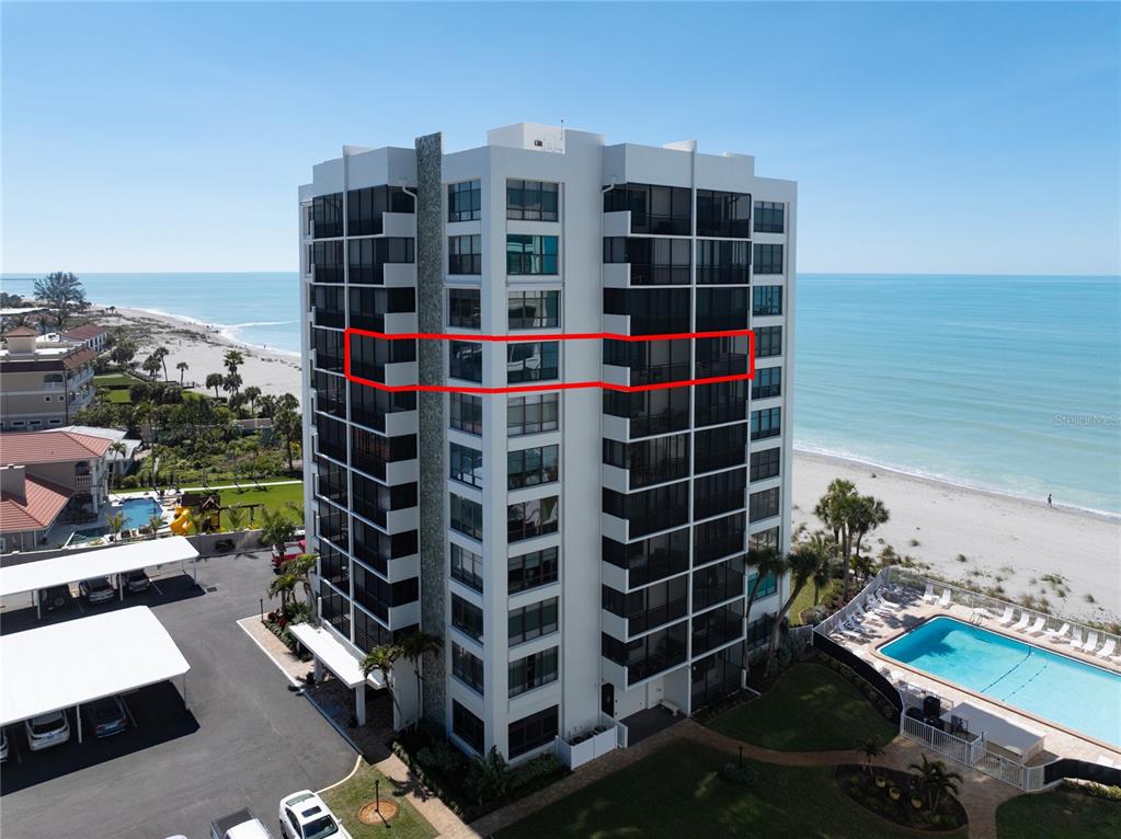 631 Alhambra Road, Unit 801 Venice, FL 34285 - Photo 1 of 1 a view of building with an outdoor space