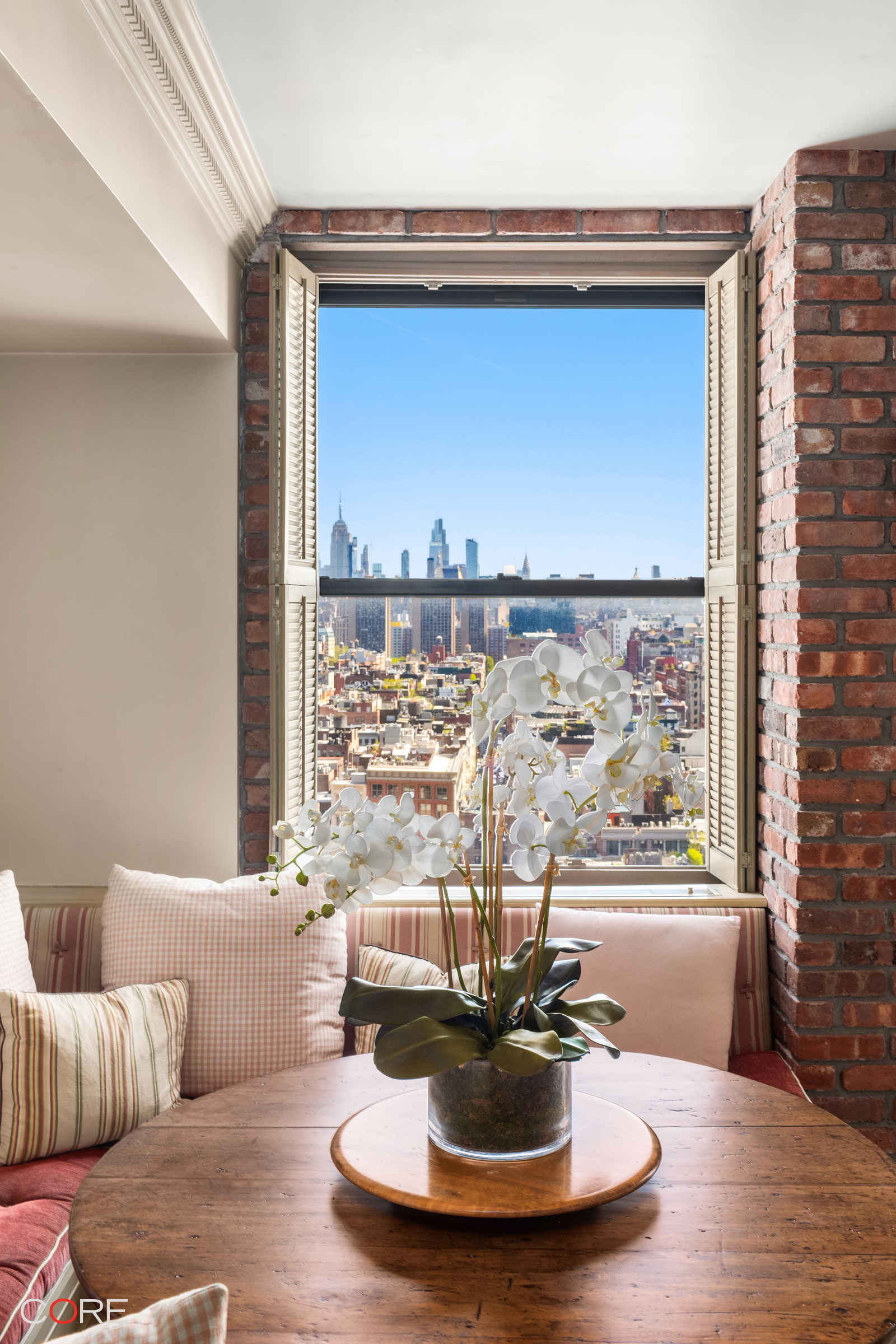 90 Franklin Street, Unit PH Manhattan, NY 10013 - Photo 11 of 25 a living room with furniture and a large window