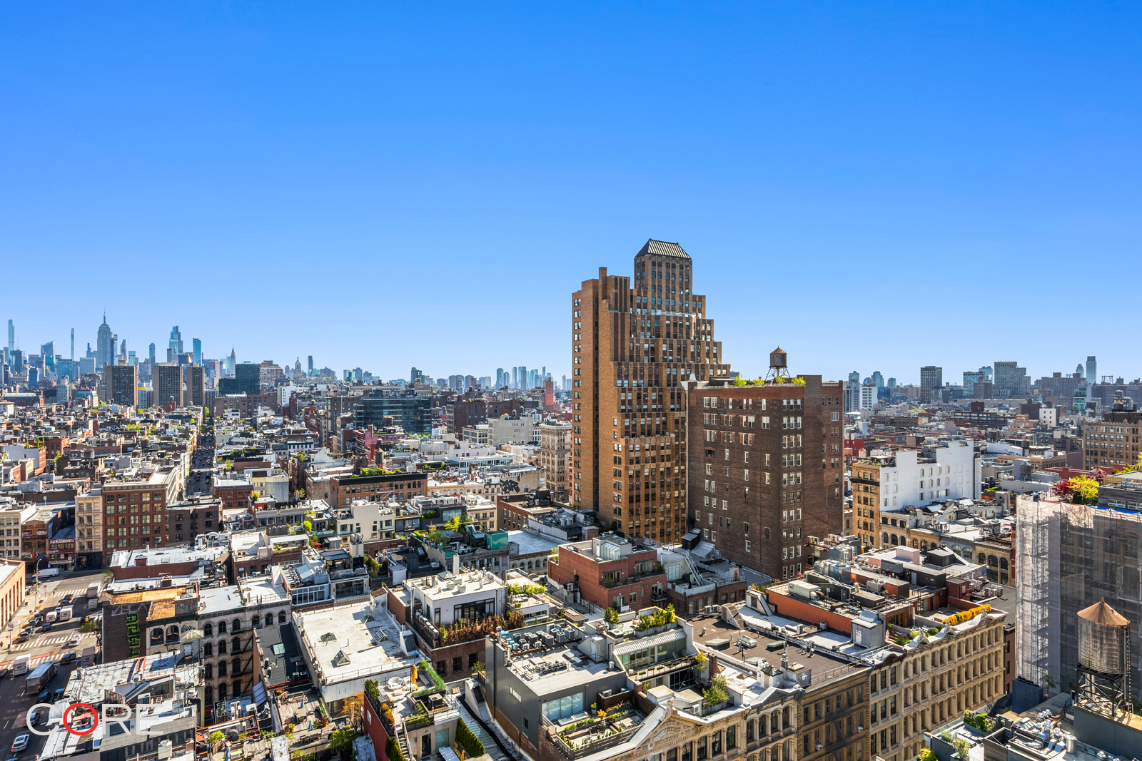 90 Franklin Street, Unit PH Manhattan, NY 10013 - Photo 19 of 25 a view of a city with tall buildings