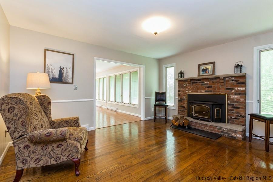37 Michael Drive Cottekill, NY 12419 - Photo 13 of 30 a living room with furniture and a fireplace