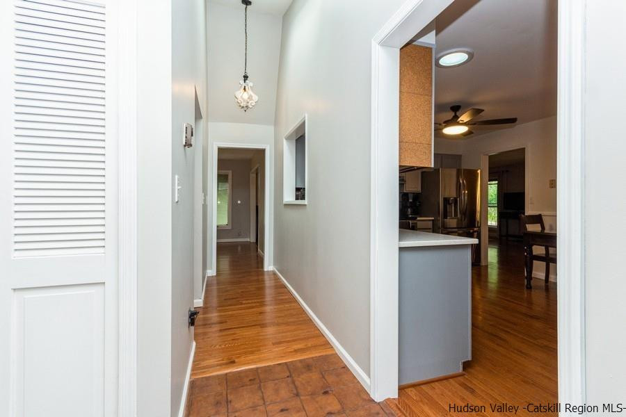 37 Michael Drive Cottekill, NY 12419 - Photo 14 of 30 a view of a hallway with wooden floor and a living room