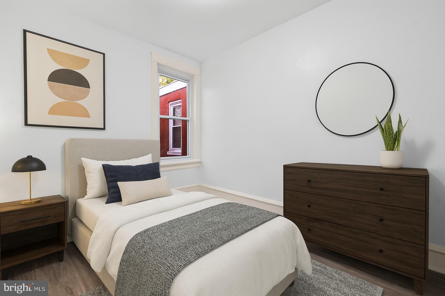 344 Middlesex Street Gloucester City, NJ 08030 - Photo 21 of 25 a bedroom with a bed and a painting on the wall