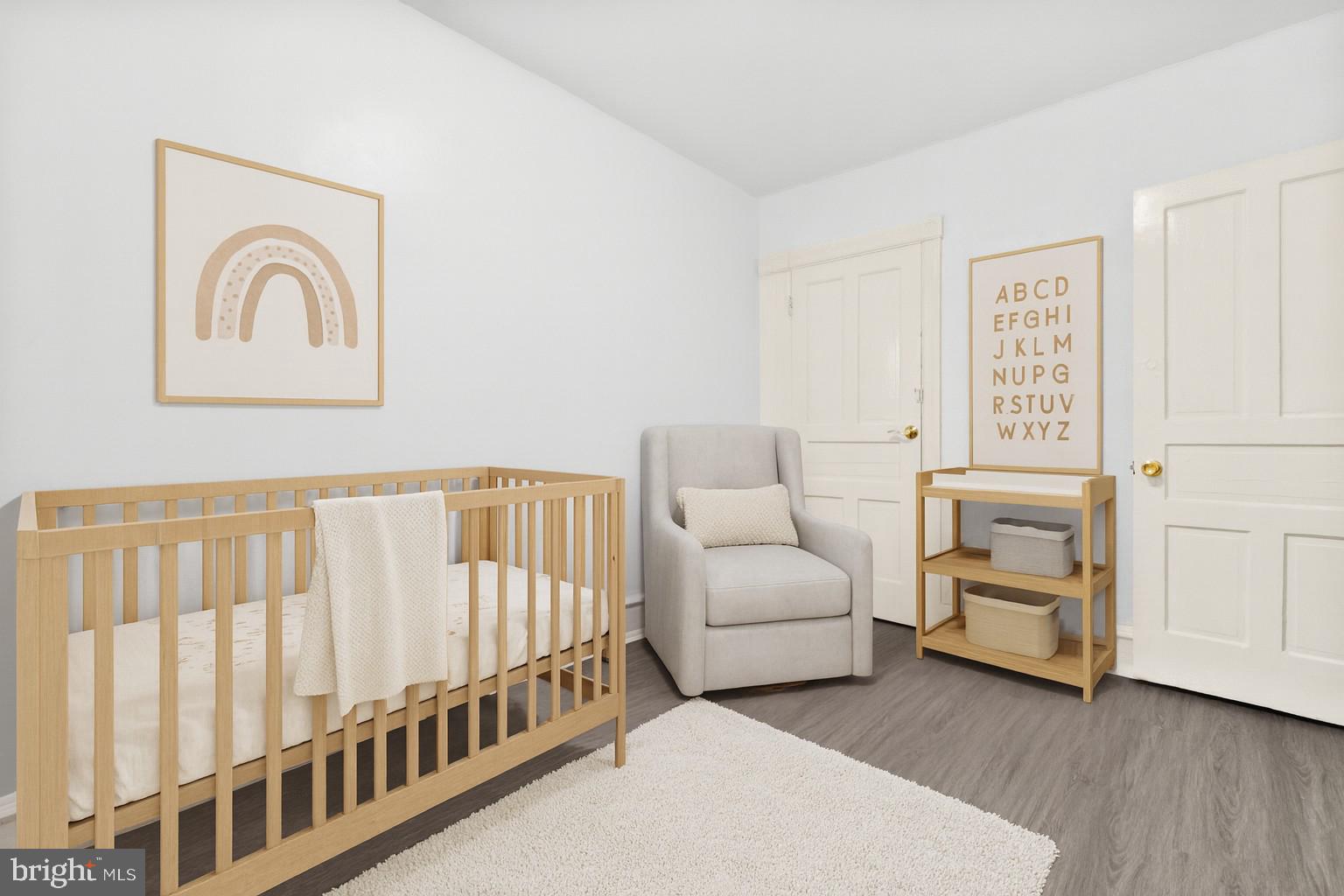 344 Middlesex Street Gloucester City, NJ 08030 - Photo 23 of 25 a living room with furniture and baby crib