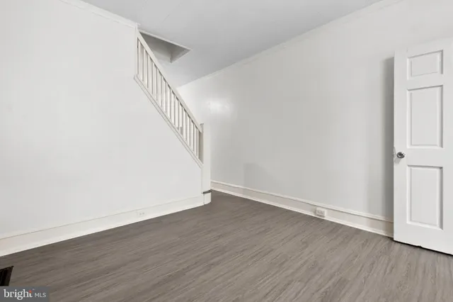 a view of entryway with wooden floor