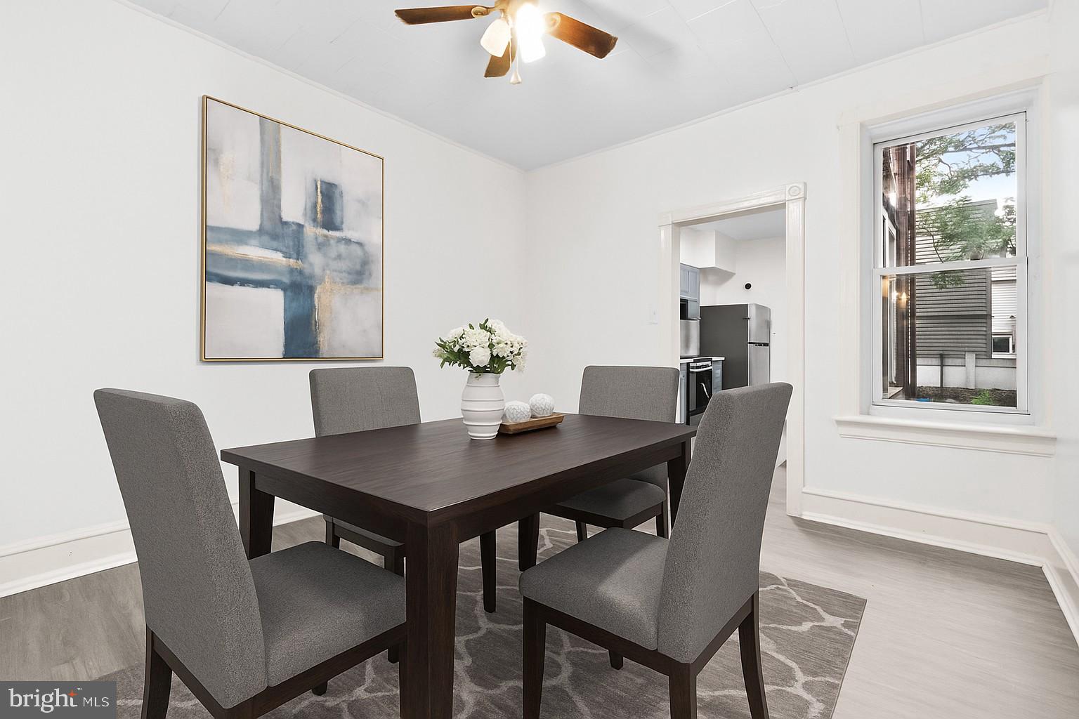 344 Middlesex Street Gloucester City, NJ 08030 - Photo 10 of 25 a view of a dining room with a table and chairs