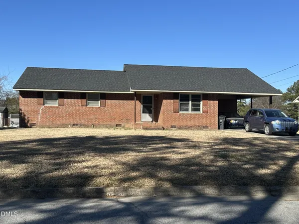 a view of pool with outdoor seating