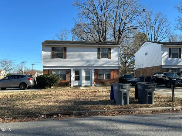 a view of a house with a street