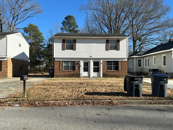 a front view of a house with a porch
