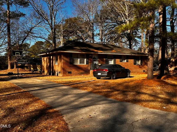 a view of street with parked cars