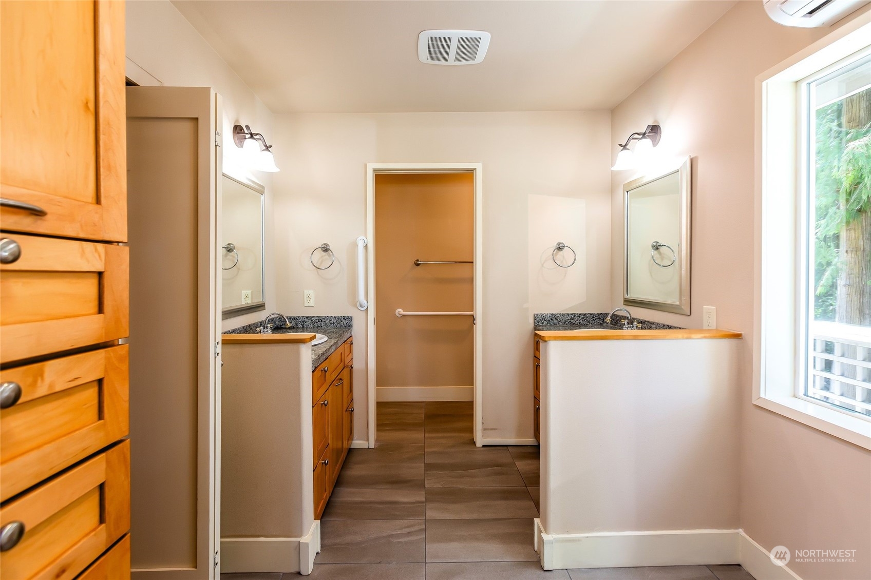 63 Point Caution Drive Friday Harbor, WA 98250 - Photo 16 of 30 a bathroom with a tub and a glass door