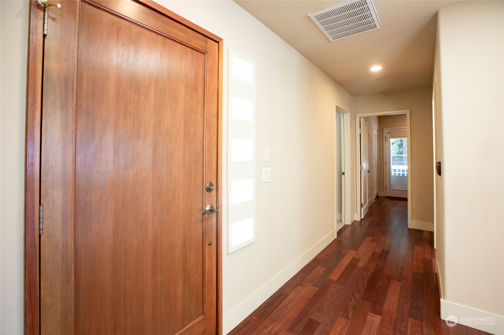 63 Point Caution Drive Friday Harbor, WA 98250 - Photo 19 of 30 a view of a hallway with wooden floor