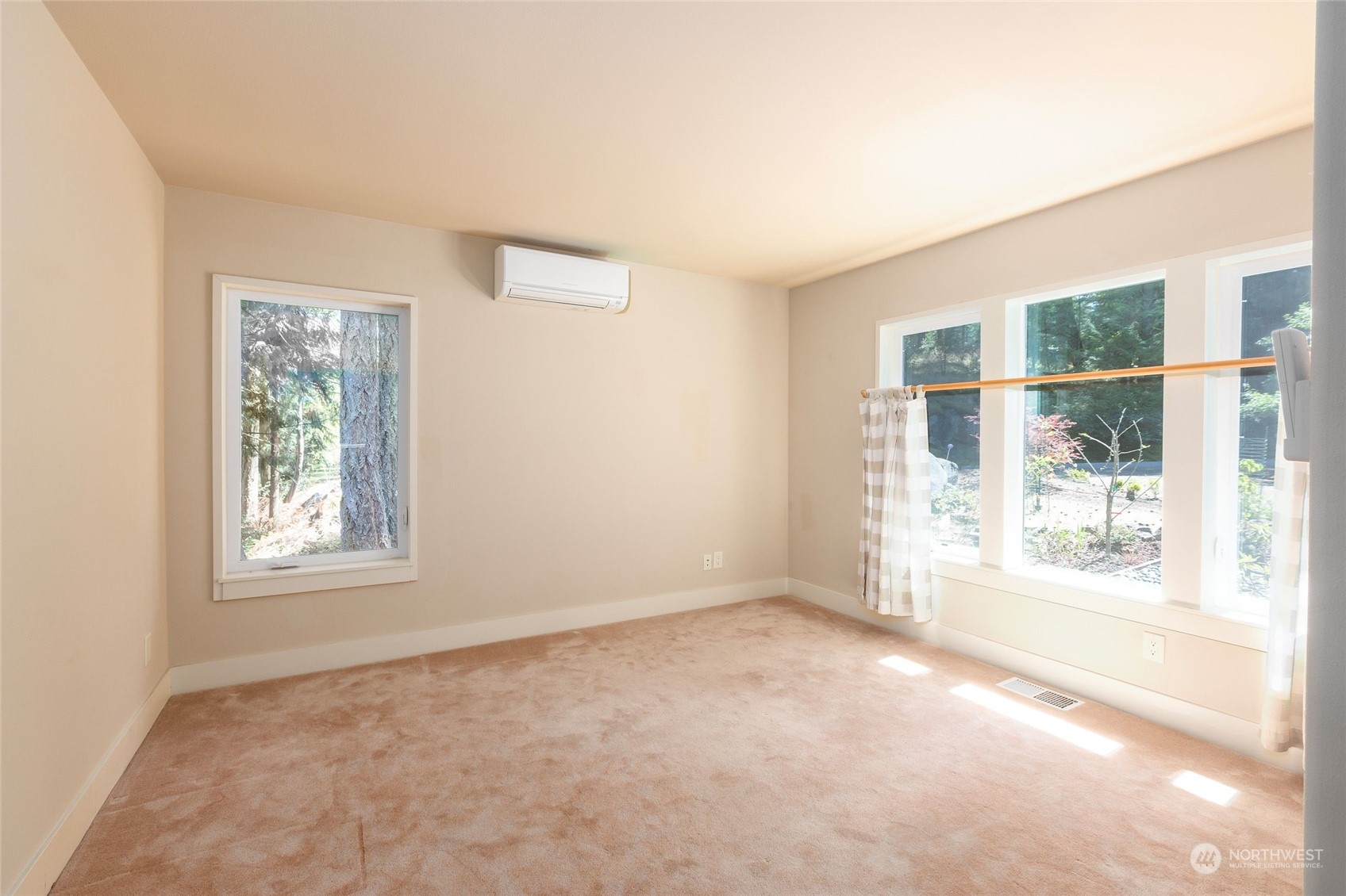 63 Point Caution Drive Friday Harbor, WA 98250 - Photo 20 of 30 an empty room with windows