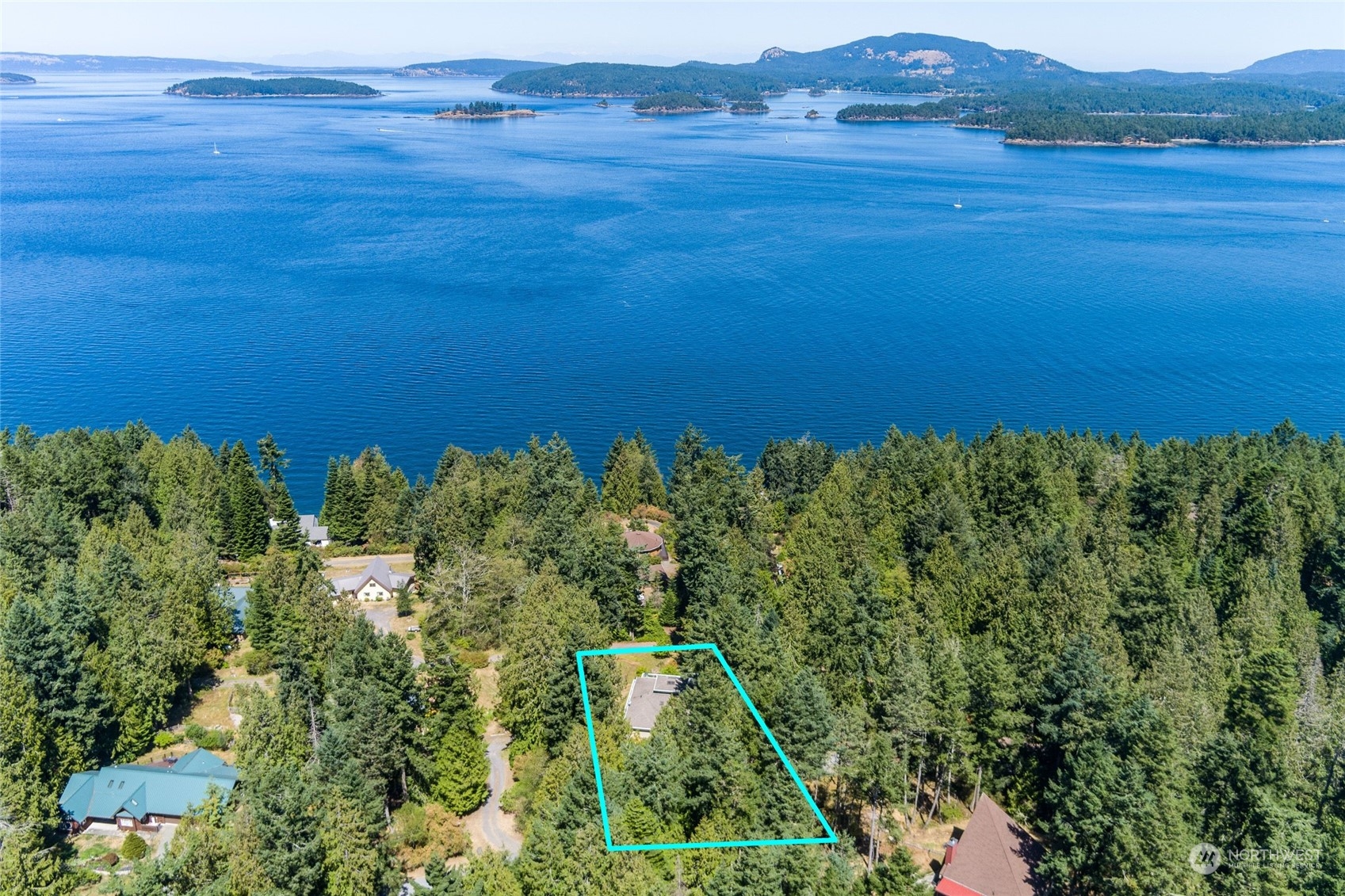 63 Point Caution Drive Friday Harbor, WA 98250 - Photo 4 of 30 an aerial view of a houses with a yard