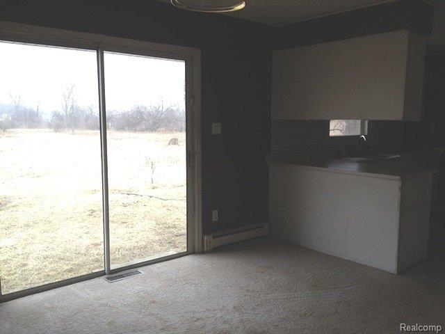12246 Griffin Road Memphis, MI 48041 - Photo 9 of 18 264-017006-dining room.JPG